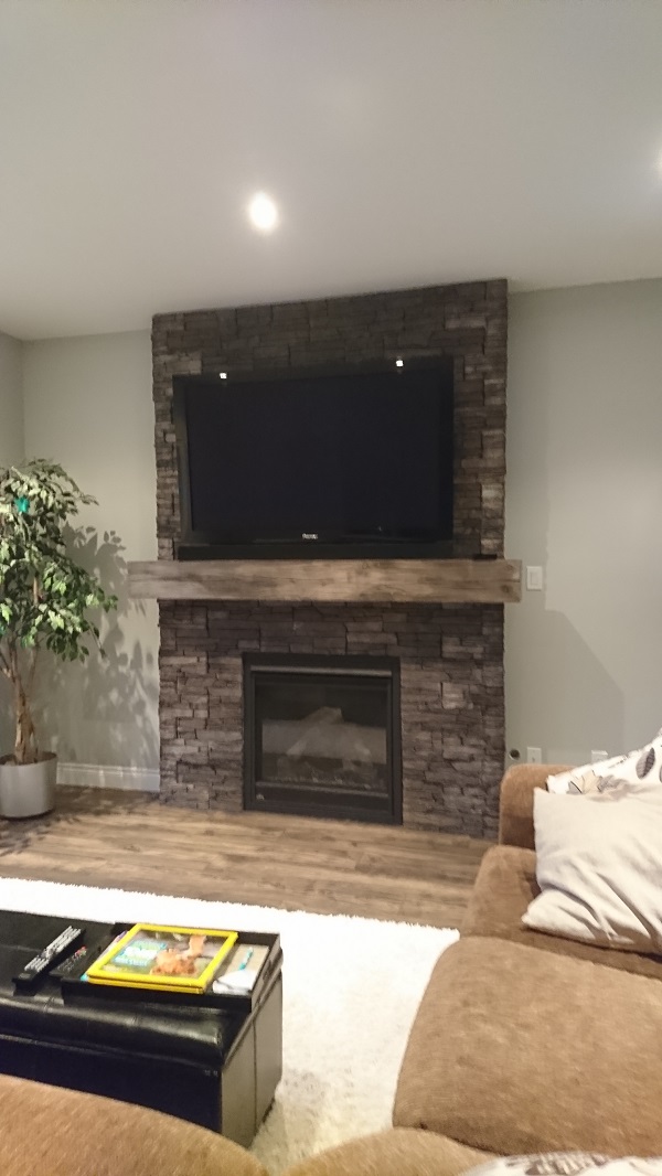 Living Room Fireplace Featuring Stonecraft Stone Veneer - The Cultured ...